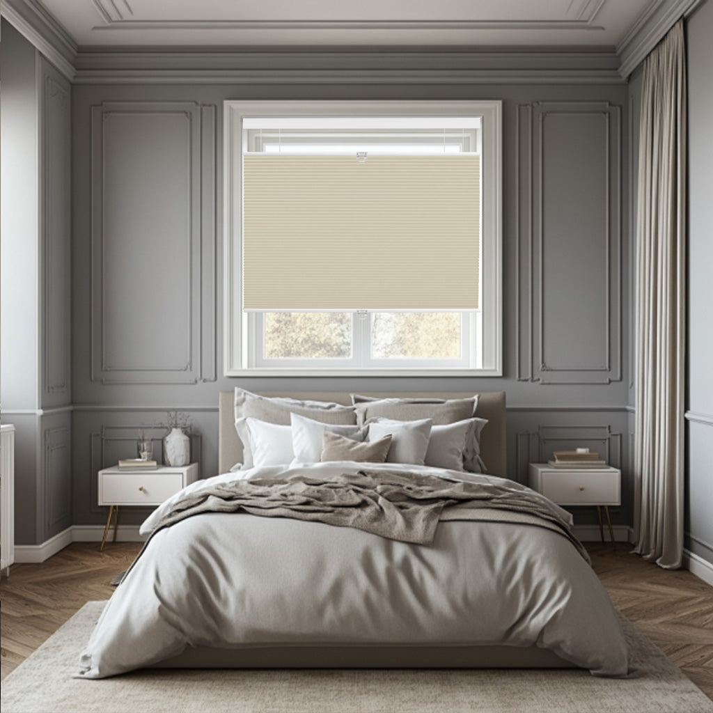 Modern bedroom with gray walls, beige bed linens, beige roller shade on window, and white nightstands