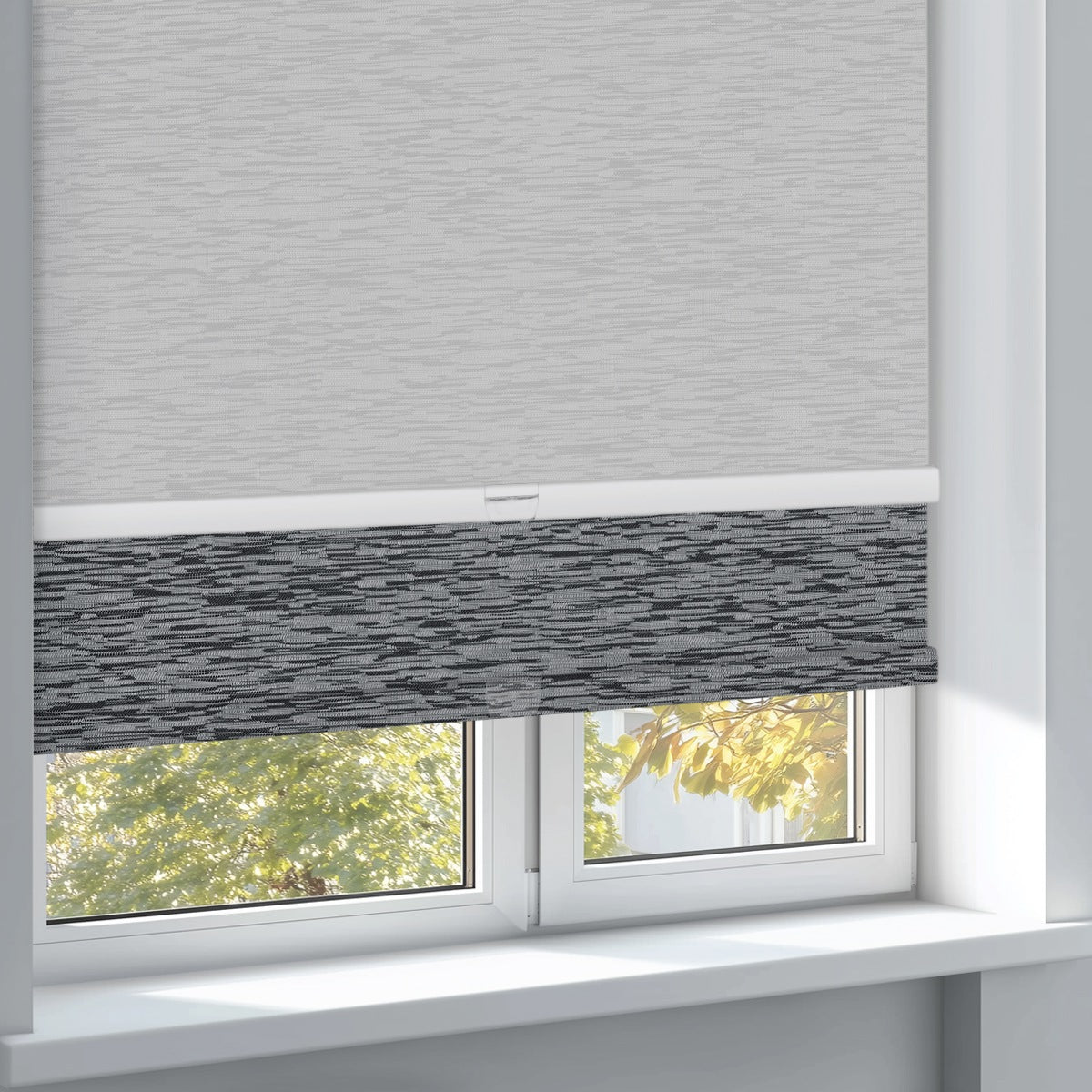 Sulugood Cordless Dual Roller Shades Blackout and Light Filtering Shades with Cassette Valance installed in a window.