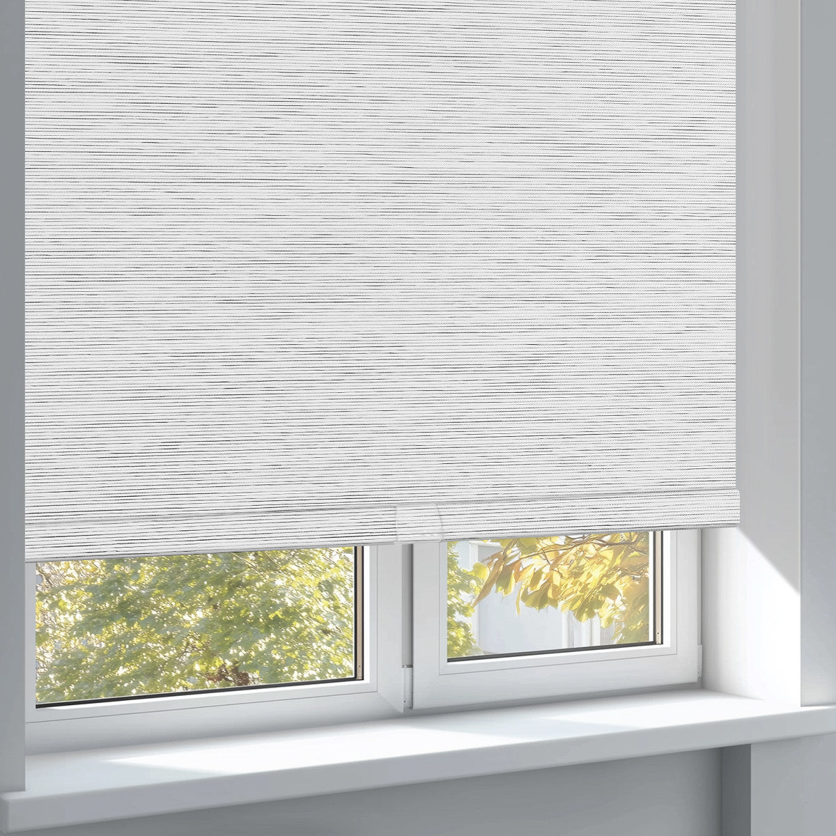 Sulugood Blckout Hand-Held Cassette Valance Roller Shades in a window, providing elegant light control and privacy.