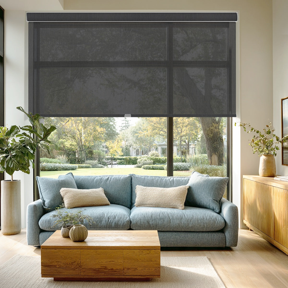 Sulugood Clearer Outdoor View Sunweave Fabric Roller Shades installed in a stylish living room with a view.