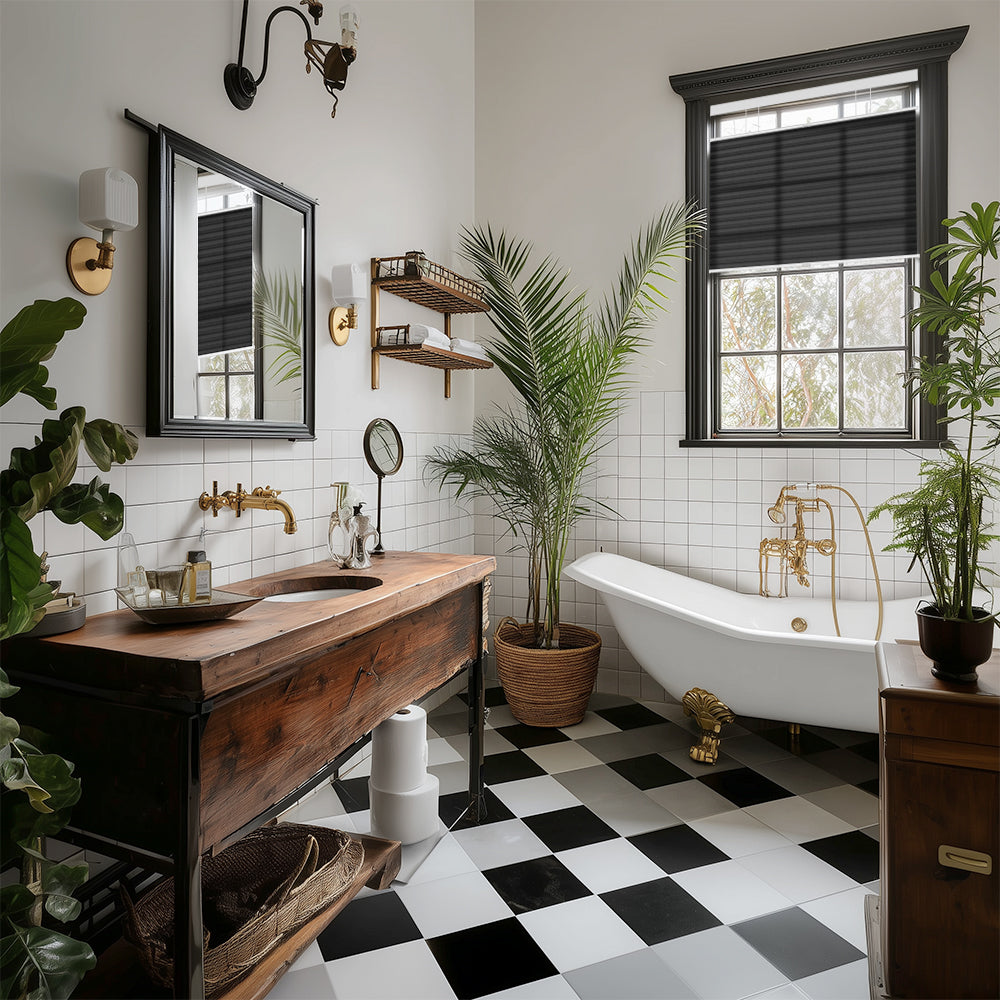 Vintage bathroom with clawfoot tub, wooden vanity, black and white checkered floor, and green plants