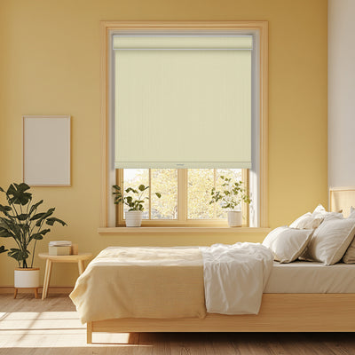 Sulugood Faux Linen Blackout Fabrics Cordless Roller Shades in a bright bedroom with plants and modern decor.