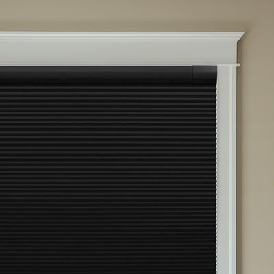 Sulugood NO Drill Same Color With Casing Cellular Shade in black installed on a window.