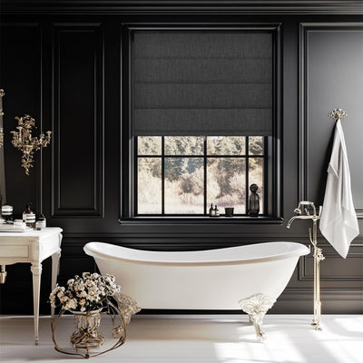 Sulugood No Drill Linen Fabric Cordless Blackout Roman Shades in a stylish black bathroom with white bathtub.