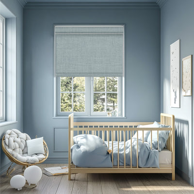 Sulugood Faux Linen Blackout Fabrics Cordless Roller Shades in a modern nursery with natural light.