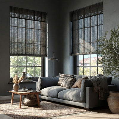 Sulugood Premium Black Hand-Woven Weather Resistant Outdoor Bamboo Shades in a cozy living room setting.
