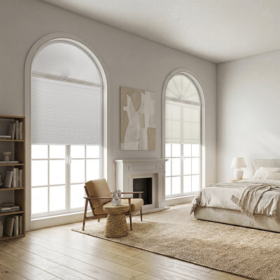 Sulugood New No Drill Arch Half Circle Cordless Cellular Shades in a modern bedroom with arched windows.