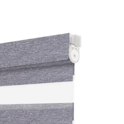 Gray textured zebra window blind with white plastic mounting bracket on white background