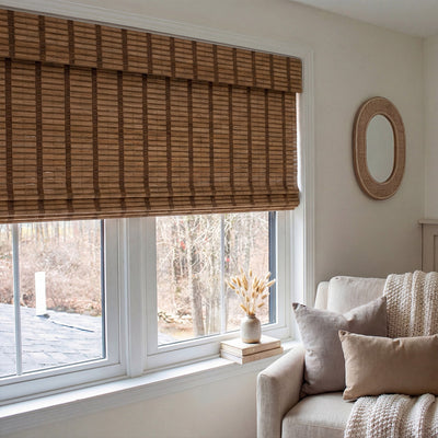 Sulugood Warm Natural Cordless Blackout Light Filtering Bamboo Roman Shades in cozy living room.