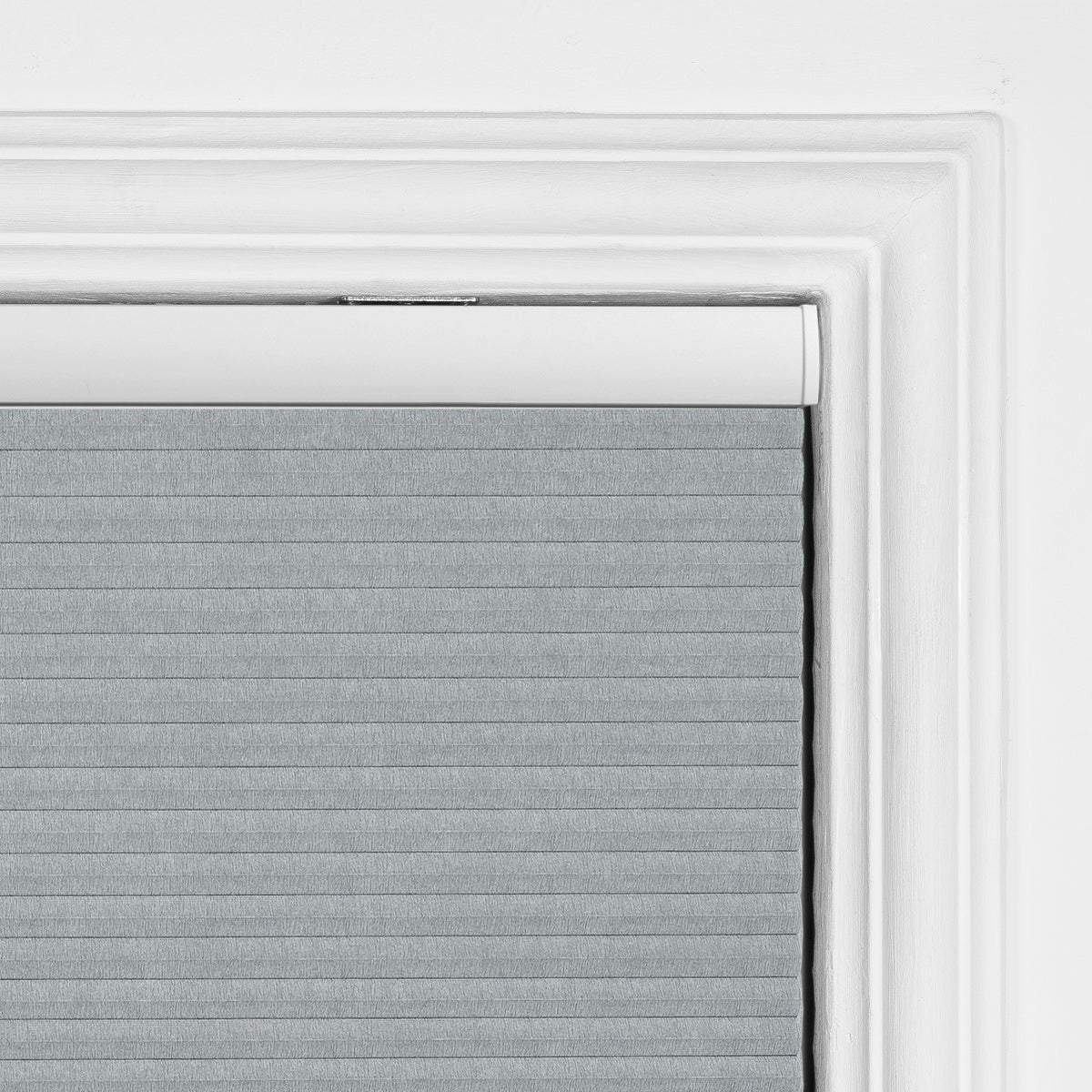 Sulugood New Arrival Premium Cell In Cell Motorized Standard Honeycomb Blinds installed in a window alcove.