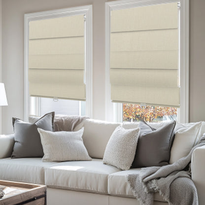 Sulugood No Drill Linen Fabric Cordless Roman Shades in a bright living room with a comfy sofa.