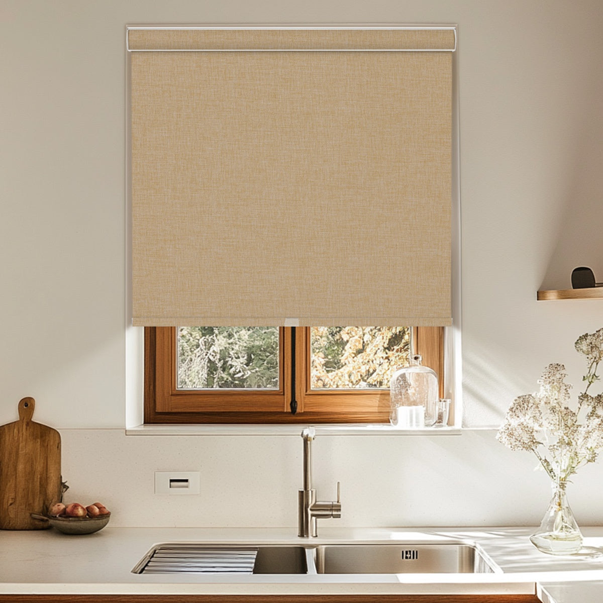 Modern kitchen window with beige roller blind, stainless steel sink, cutting board, and decorative flowers